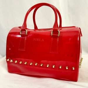 Furla | small ruby-red jelly couture boston "candy bag" with gold studs